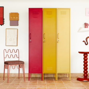 Colorful Mustard Made lockers in Butter, red, and yellow, set against a bright, stylish interior decor.