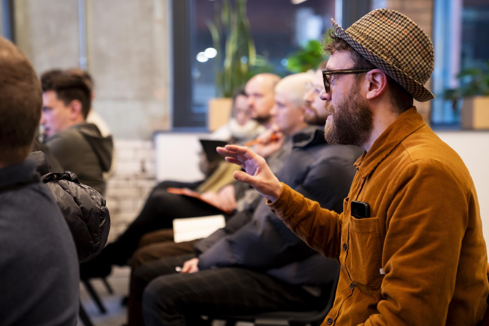 Audience engaged in a discussion, exploring the innovative applications of graphene materials in Manchester.