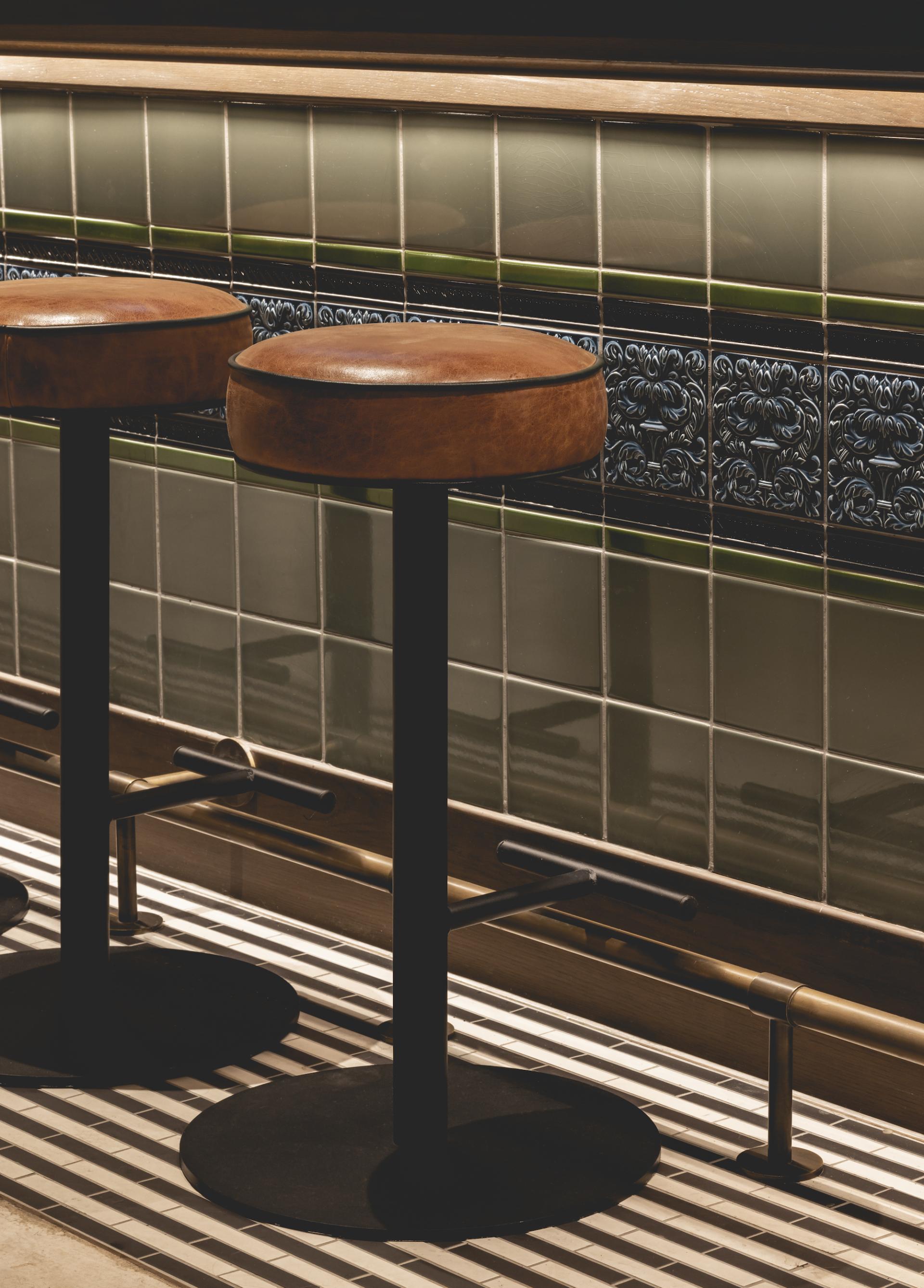 Stylish bar stools in The Libertine, a new hospitality venue at the historic Royal Exchange in London.