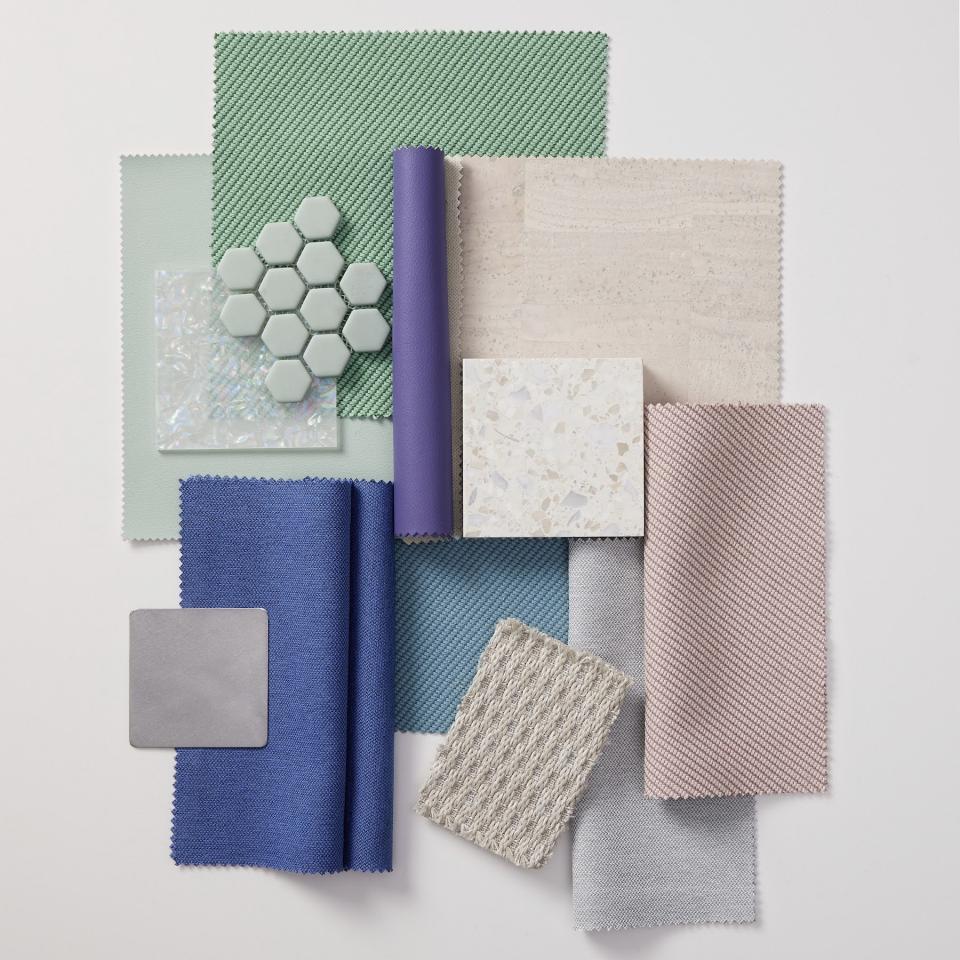 Fabric swatches, tiles, and finishes showcasing color and texture, highlighting trends for future interior design from Camira's New Perspectives guide.