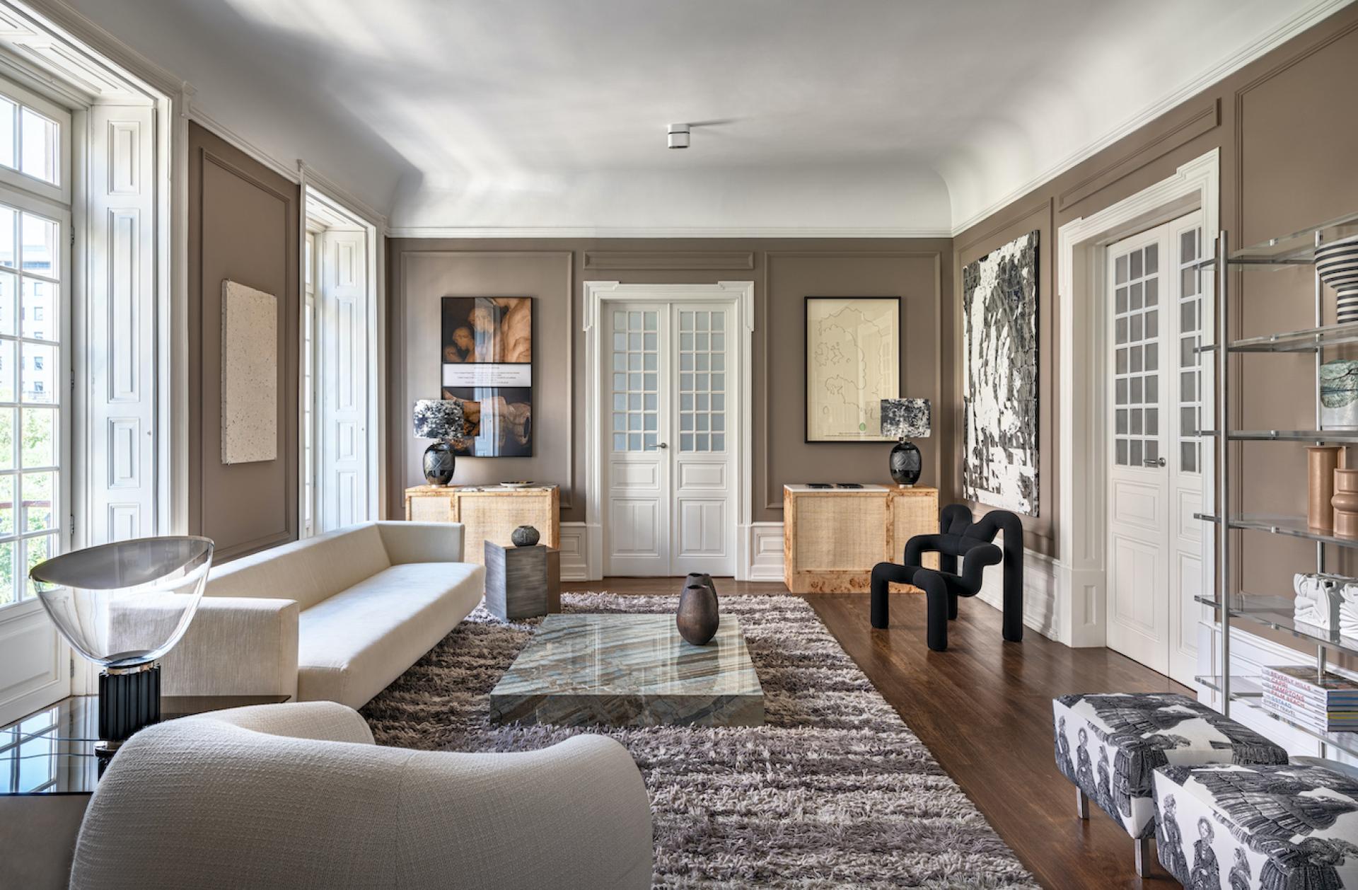 Luxurious living room featuring contemporary furniture pieces by Cristina Jorge de Carvalho, showcasing elegant design and modern decor.