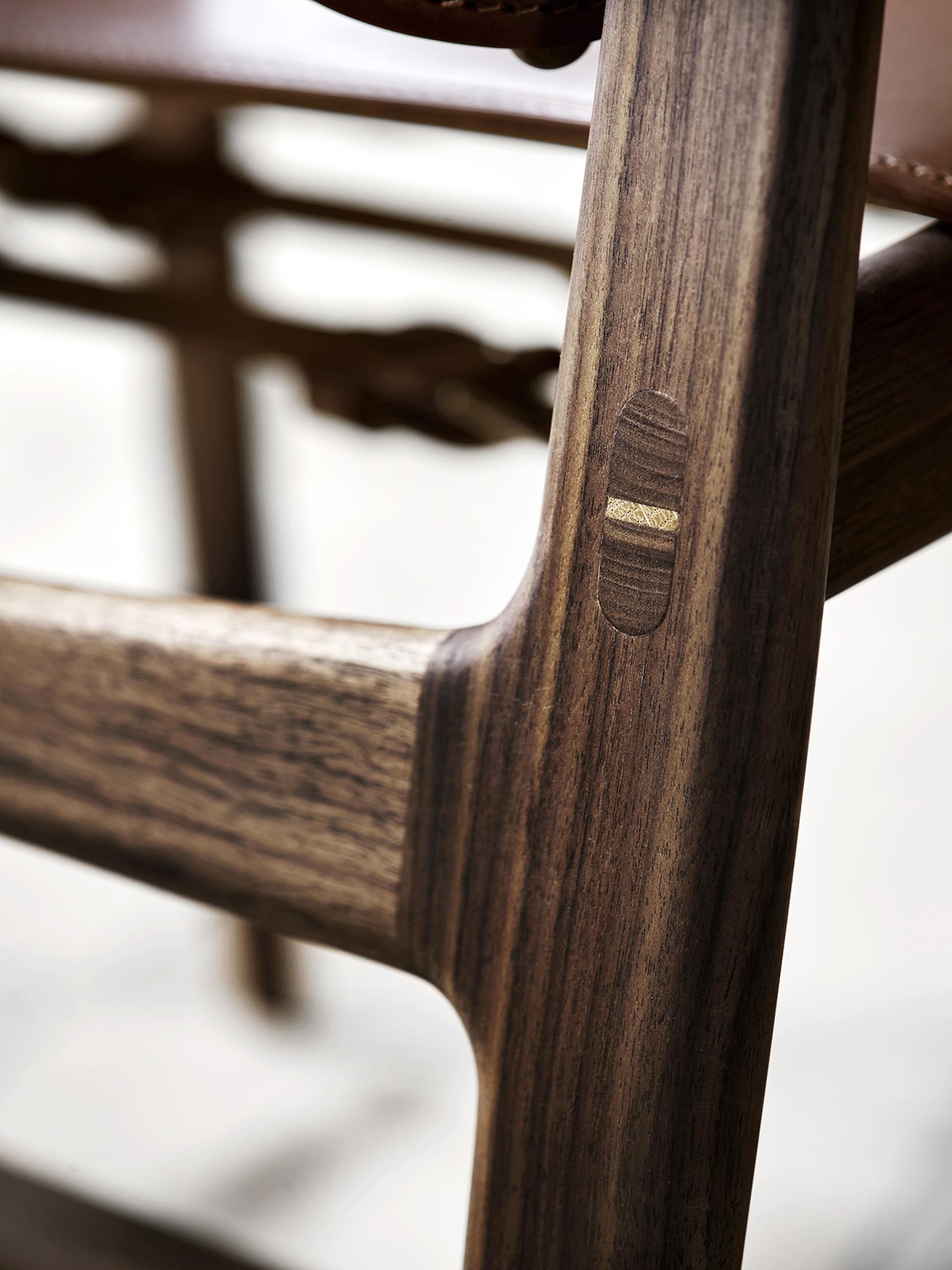 Close-up of the Huntsman Chair's fine craftsmanship, highlighting the elegant wood grain and distinctive joinery design by Børge Mogensen.