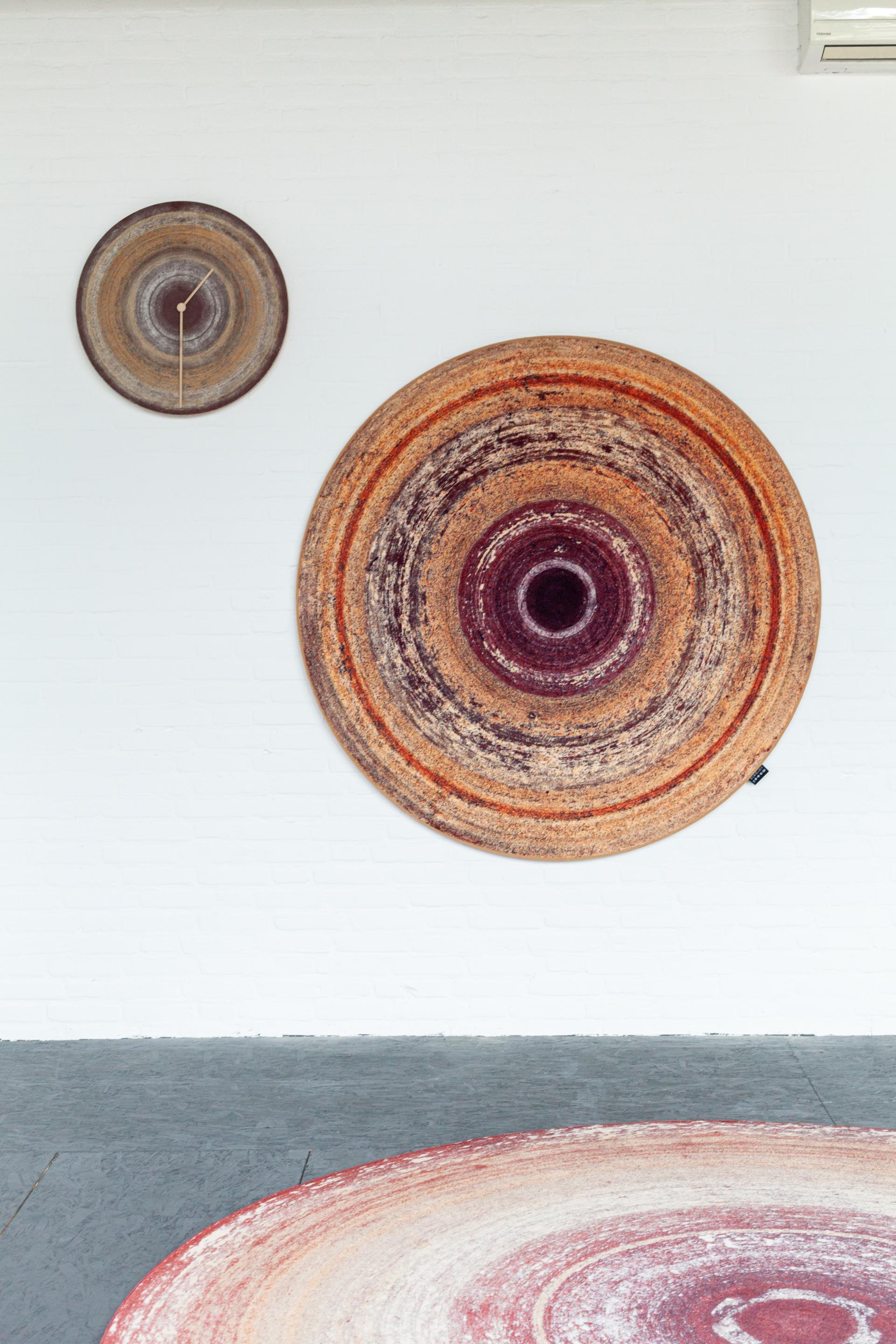 Colorful circular wall and floor textiles showcasing Dutch design innovation at Dutch Design Week 2024.