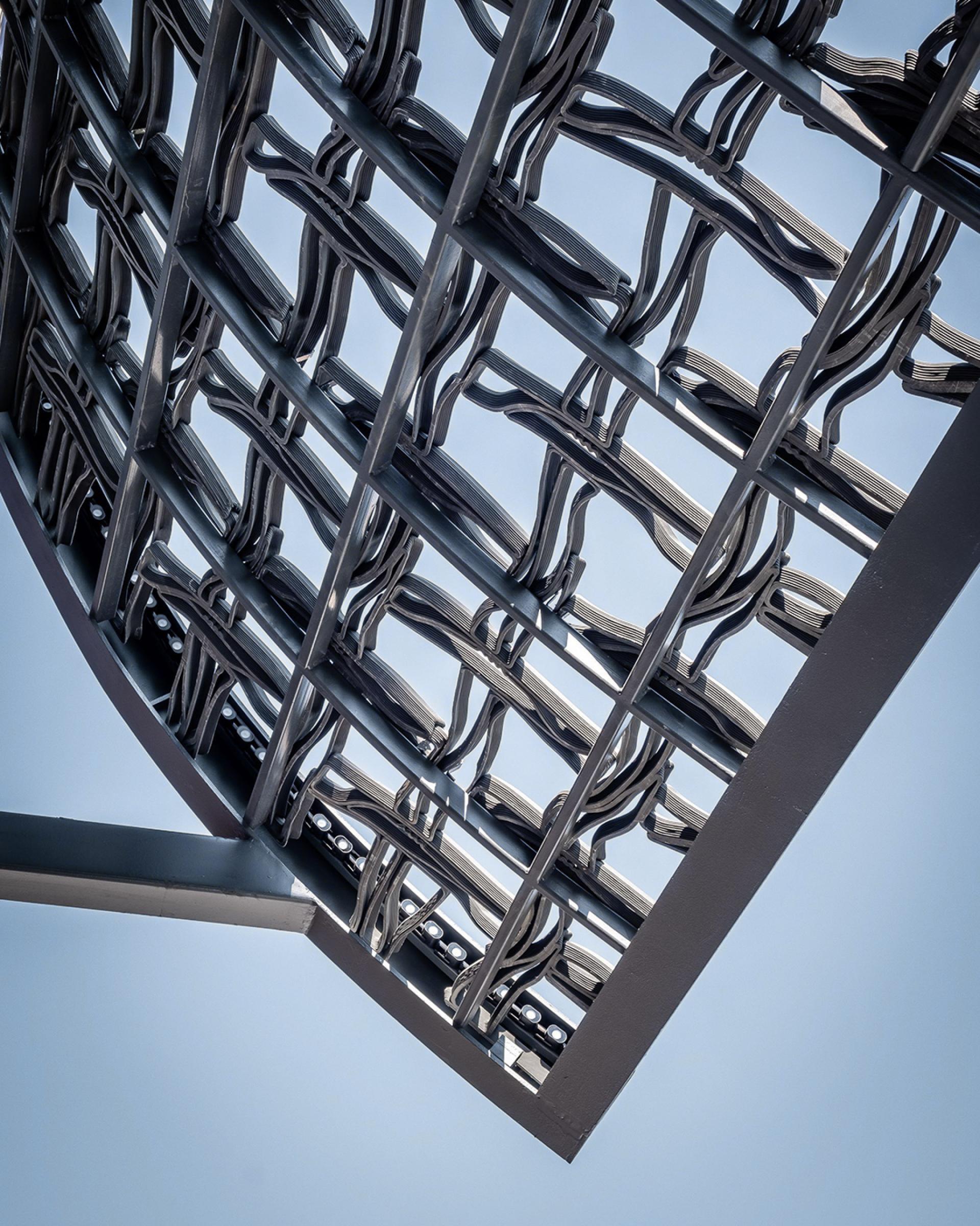 3D printed interlocking façade of the BOSS store at İstinye Park, showcasing innovative use of recycled materials.