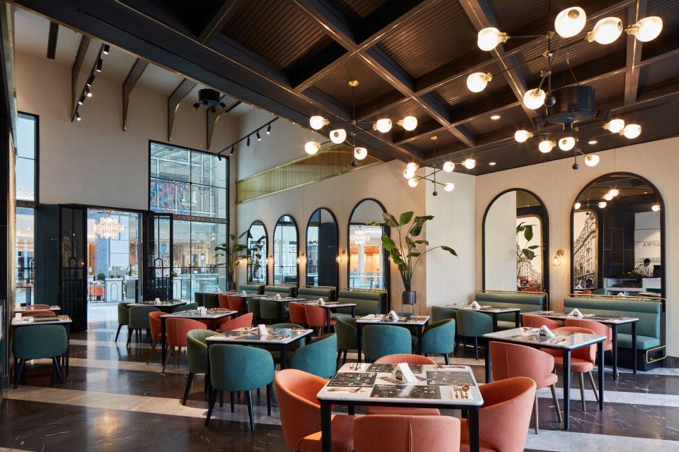 Stylish interior of Third Avenue Boutique restaurant featuring elegant seating and luxurious decor in Dubai Mall.