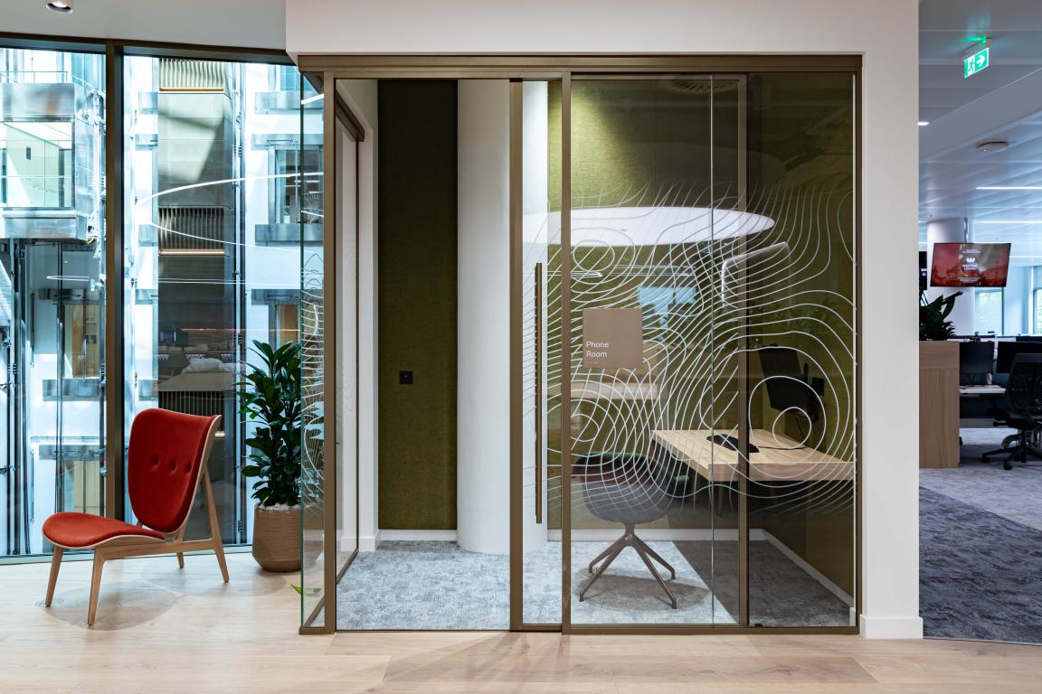 Radii supports tp bennett & Overbury with bespoke bronze framed glazed partitions at banking HQ in London.
