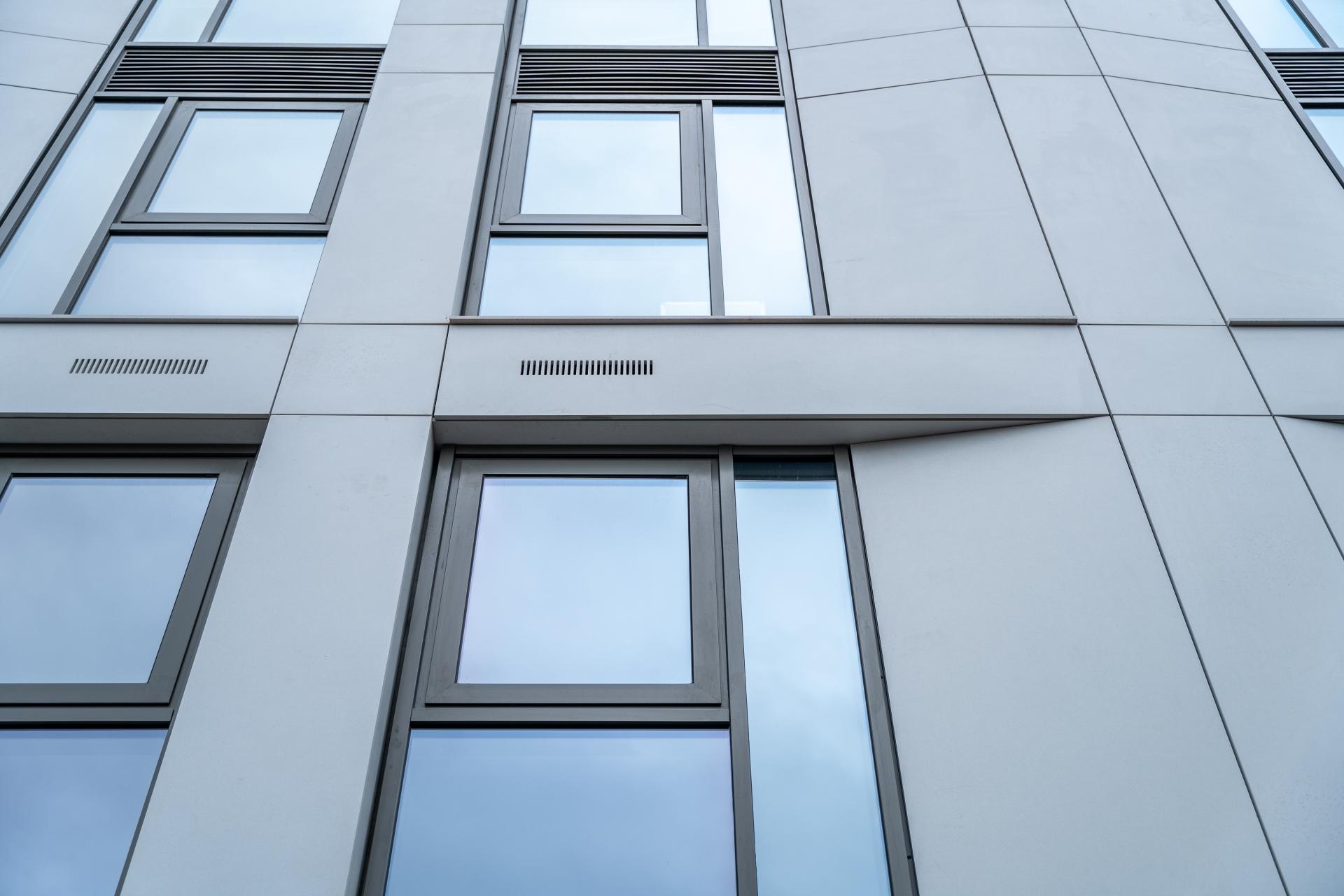 A faceted SureClad® SureStone® façade from Shackerley at New Garden Square.