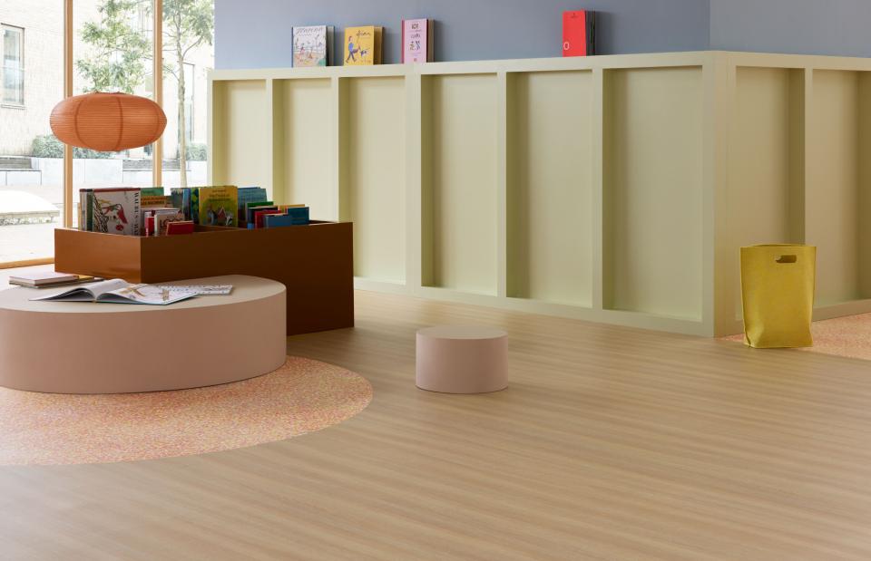 Forbo flooring contrast against yellow panelled walls