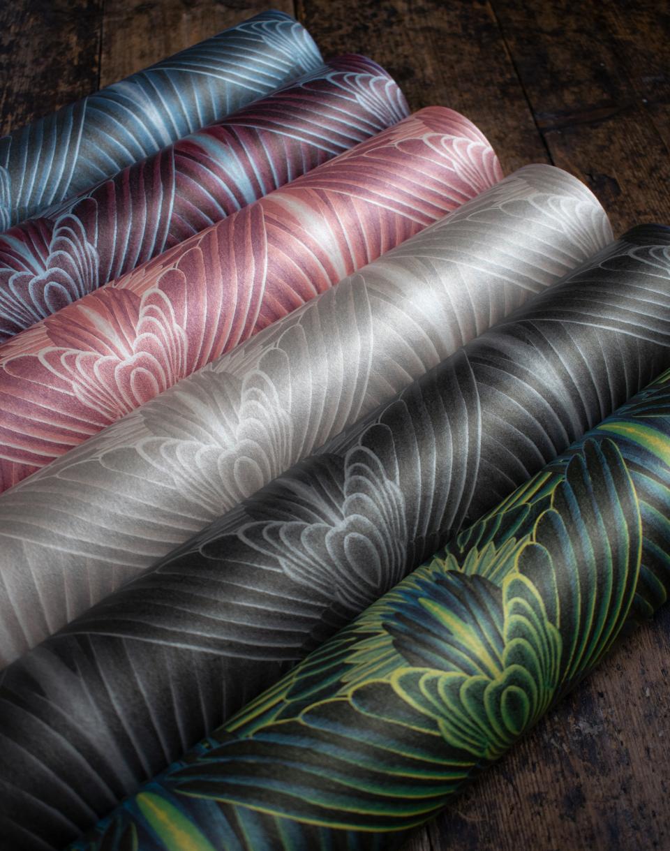 Glamorous wallpaper rolls in vibrant colors and intricate designs from Divine Savages' latest collection, Gershwing.