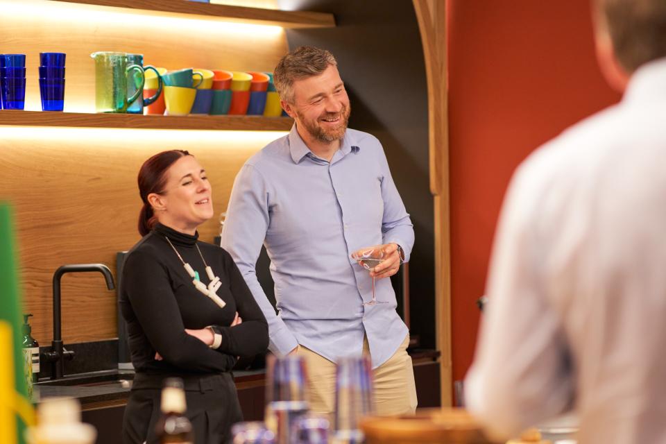 Engaged audience members enjoying discussion at Material Source Studio's Glasgow Property Outlook seminar.