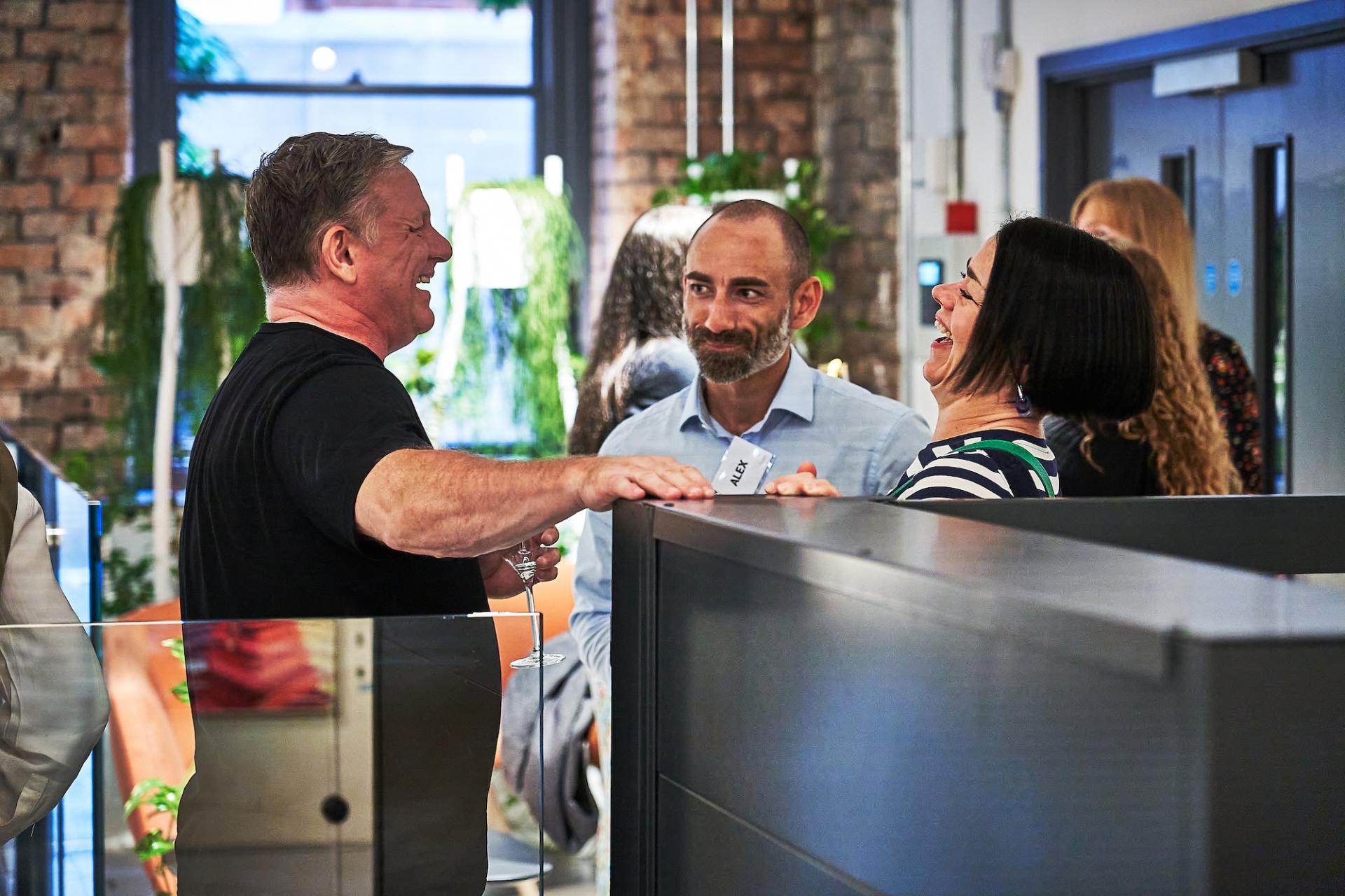 Networking event featuring engaged participants celebrating the final episode of the podcast 42 Roles in the Built Environment.