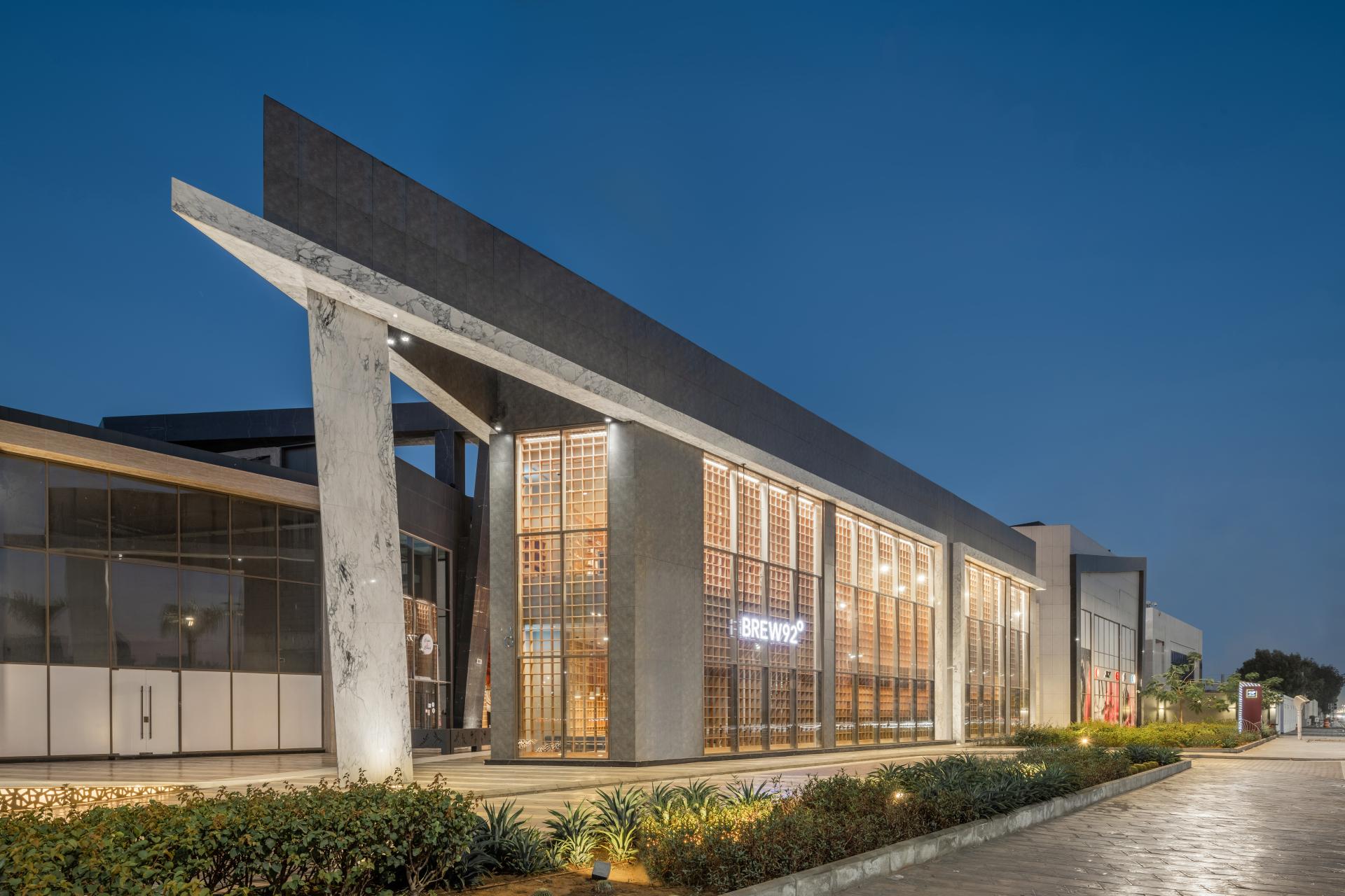 Newly designed Brew92 coffee shop features a Japandi aesthetic with modern architecture and elegant outdoor landscaping.