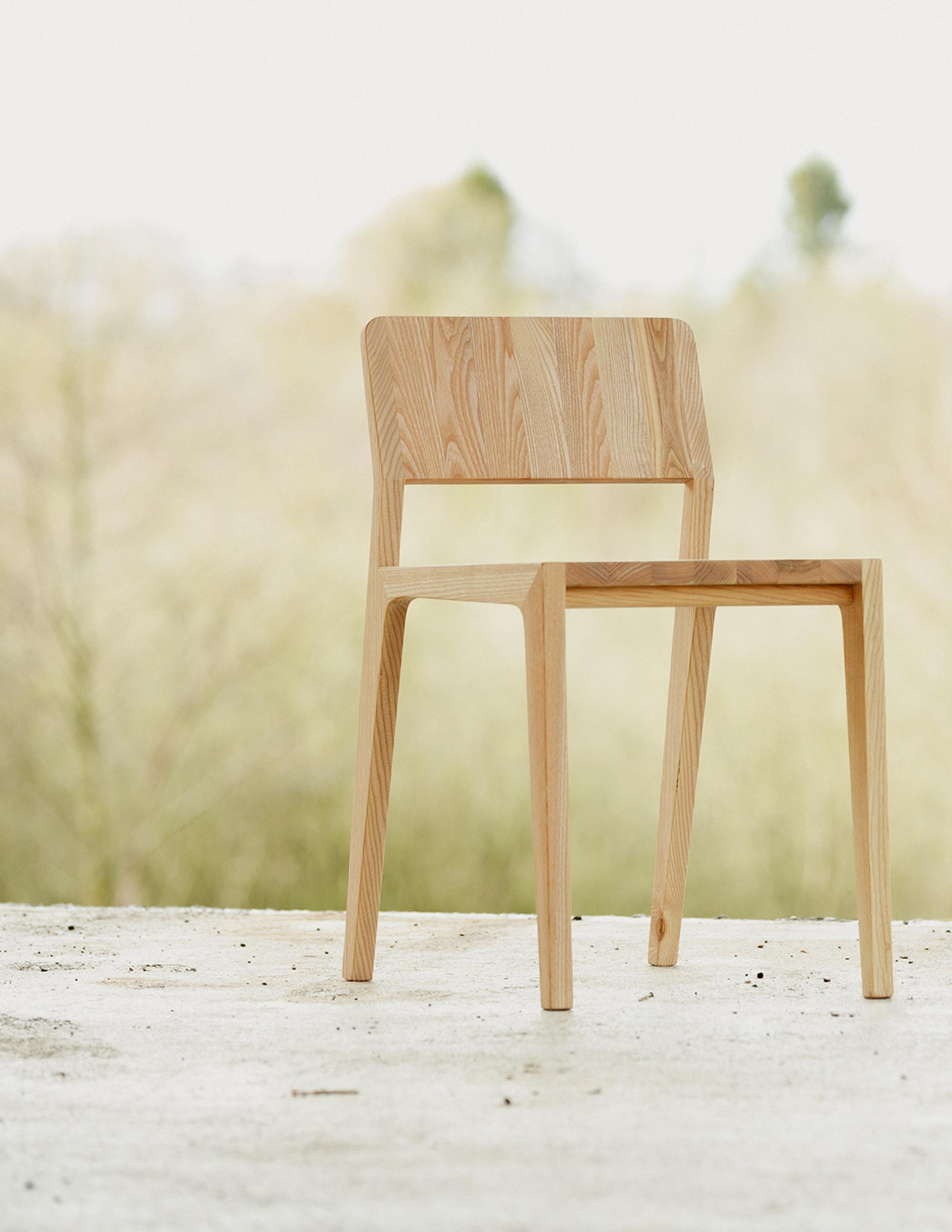 Sustainable wooden chairs showcased at Dundee Design Festival 2024, highlighting innovative design and reusable materials.