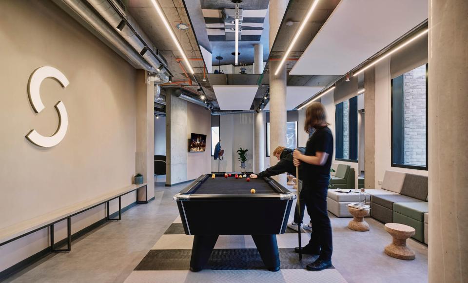 Stylish student lounge at The Tannery, featuring a pool table and contemporary seating in Leicester.