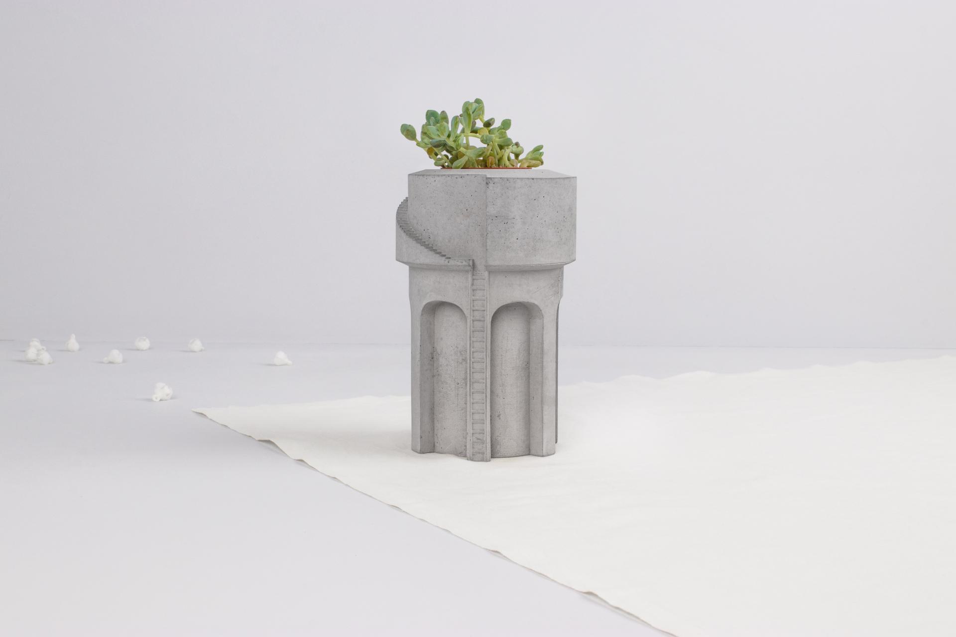 Concrete planter from Tiipoi's Siment collection, showcasing modern architecture-inspired design with a green succulent.