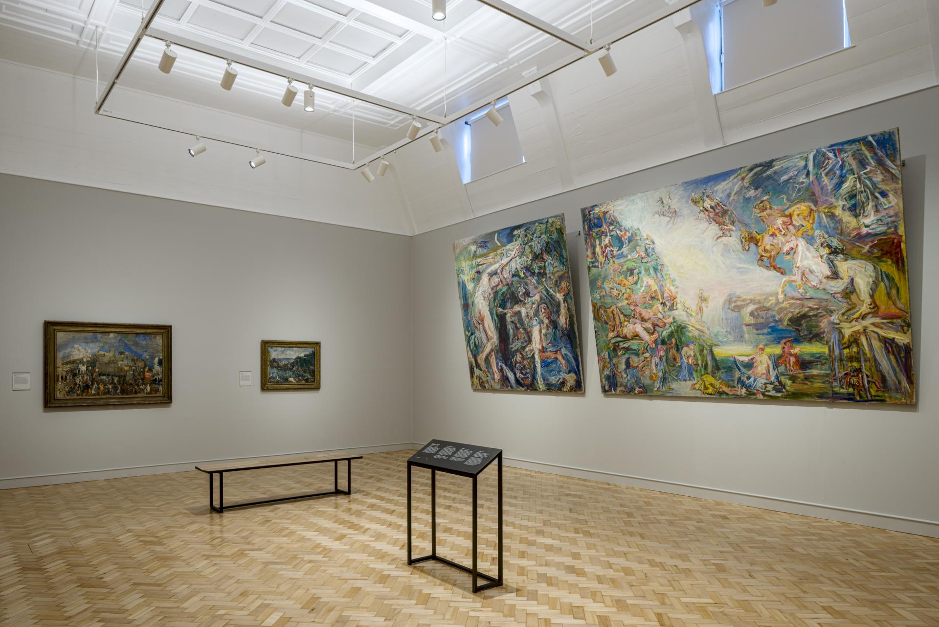 Art gallery interior featuring two large abstract paintings and a wooden bench, showcasing the redesigned visitor experience at The Courtauld Gallery.