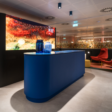 Modern reception area of Material Source Studio, featuring vibrant decor and design elements for Scotland's built environment community.