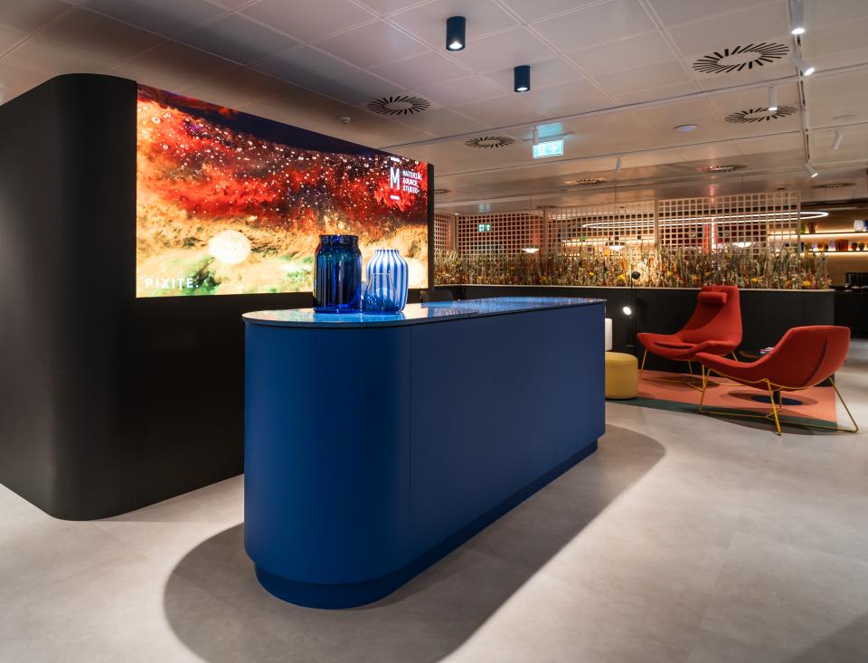 Modern reception area of Material Source Studio, featuring vibrant decor and design elements for Scotland's built environment community.