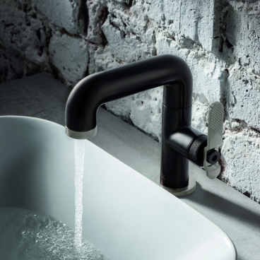 Sleek black brass sink faucet from Crosswater's UNION Mixage collection, showcasing industrial minimalism and contemporary design.