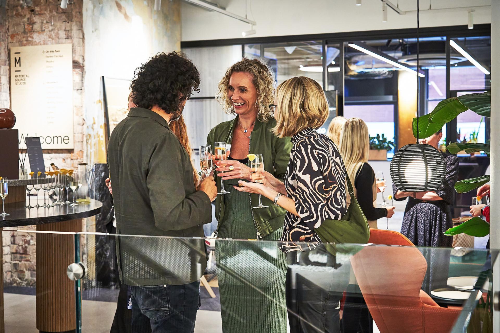 Guests celebrate the conclusion of the 42 Roles in the Built Environment podcast at a stylish gathering.