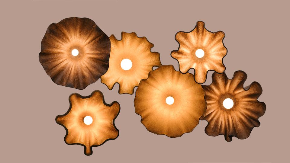 Stylish decorative lights designed for modern workplace aesthetics, showcased at the Workspace Design Show 2023.