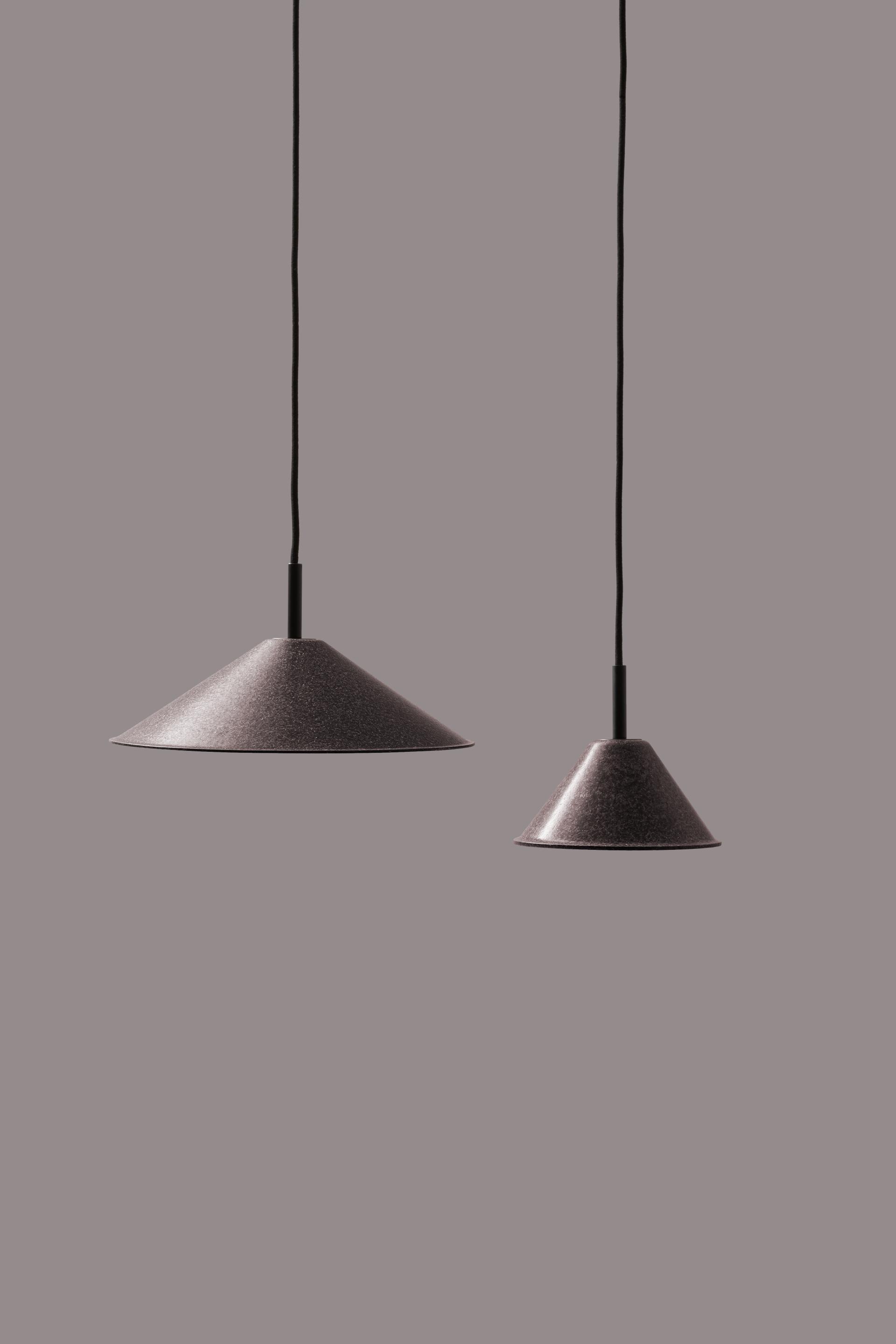 Sleek, sustainable pendant lights in two sizes, designed by High Society, showcasing modern Italian design aesthetics.