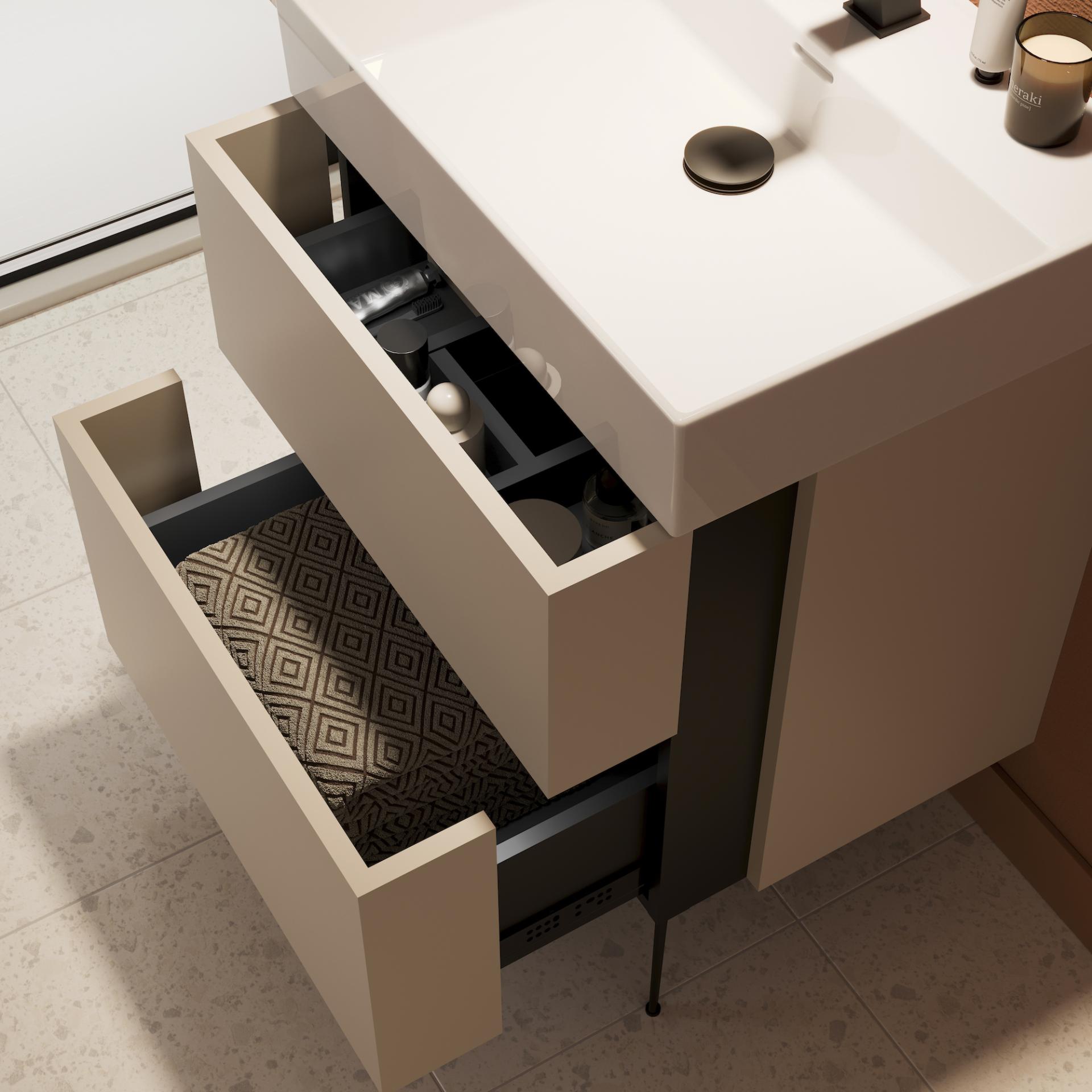 Stylish bathroom vanity with open drawers showcasing organized toiletries, emphasizing modern design and functionality for washroom safety.