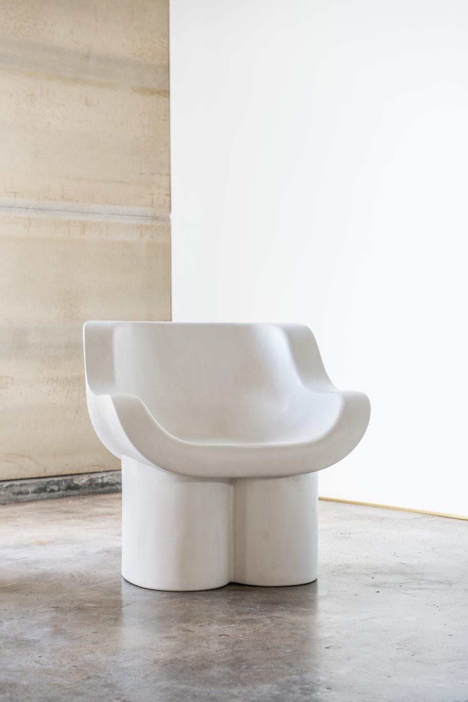 Modern sculptural chair against a minimalist gallery backdrop, featured in Reynold Rodriguez's debut solo show at Charles Burnand Gallery.