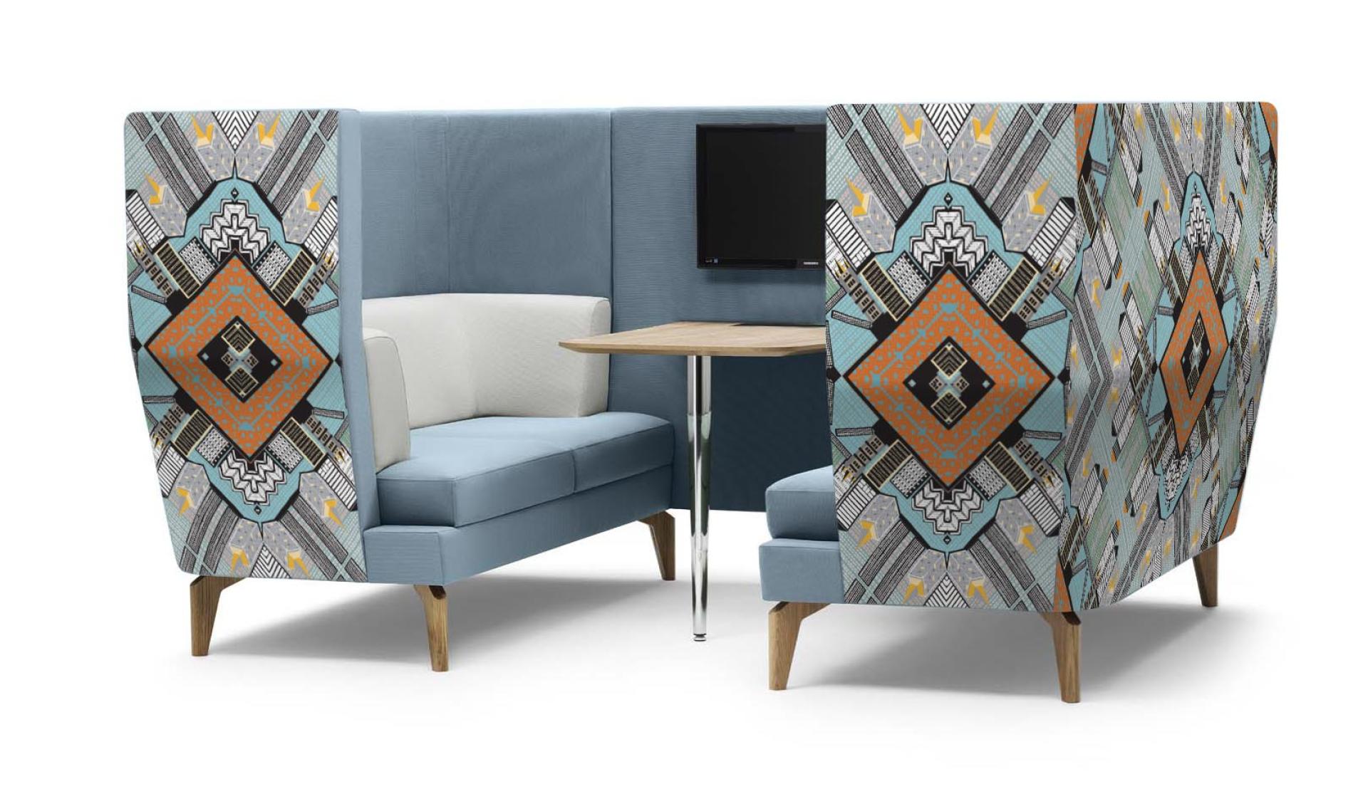 Stylish seating area featuring unique patterned upholstery, showcasing modern design elements suitable for collaborative workspaces.