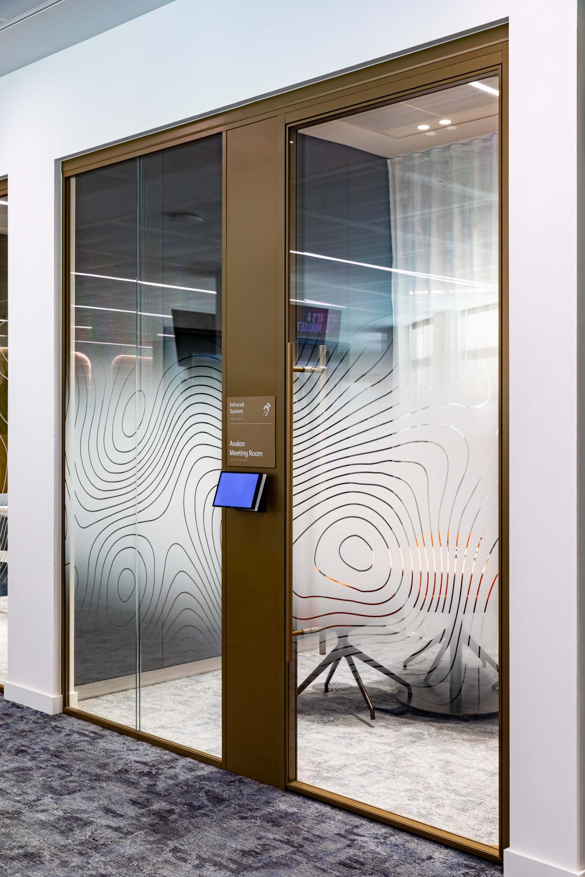 Radii supports tp bennett & Overbury with bespoke bronze framed glazed partitions at banking HQ in London.