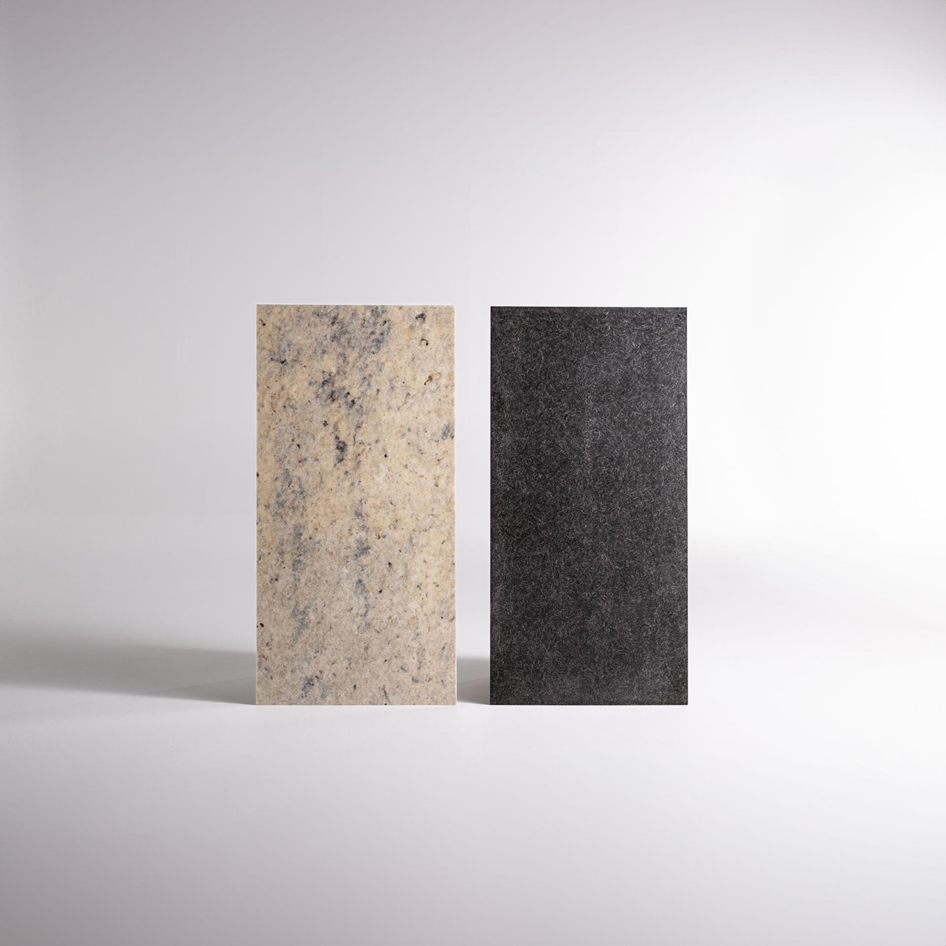 Solidwool's sustainable furniture samples, showcasing a beige and a black material made from British by-products.