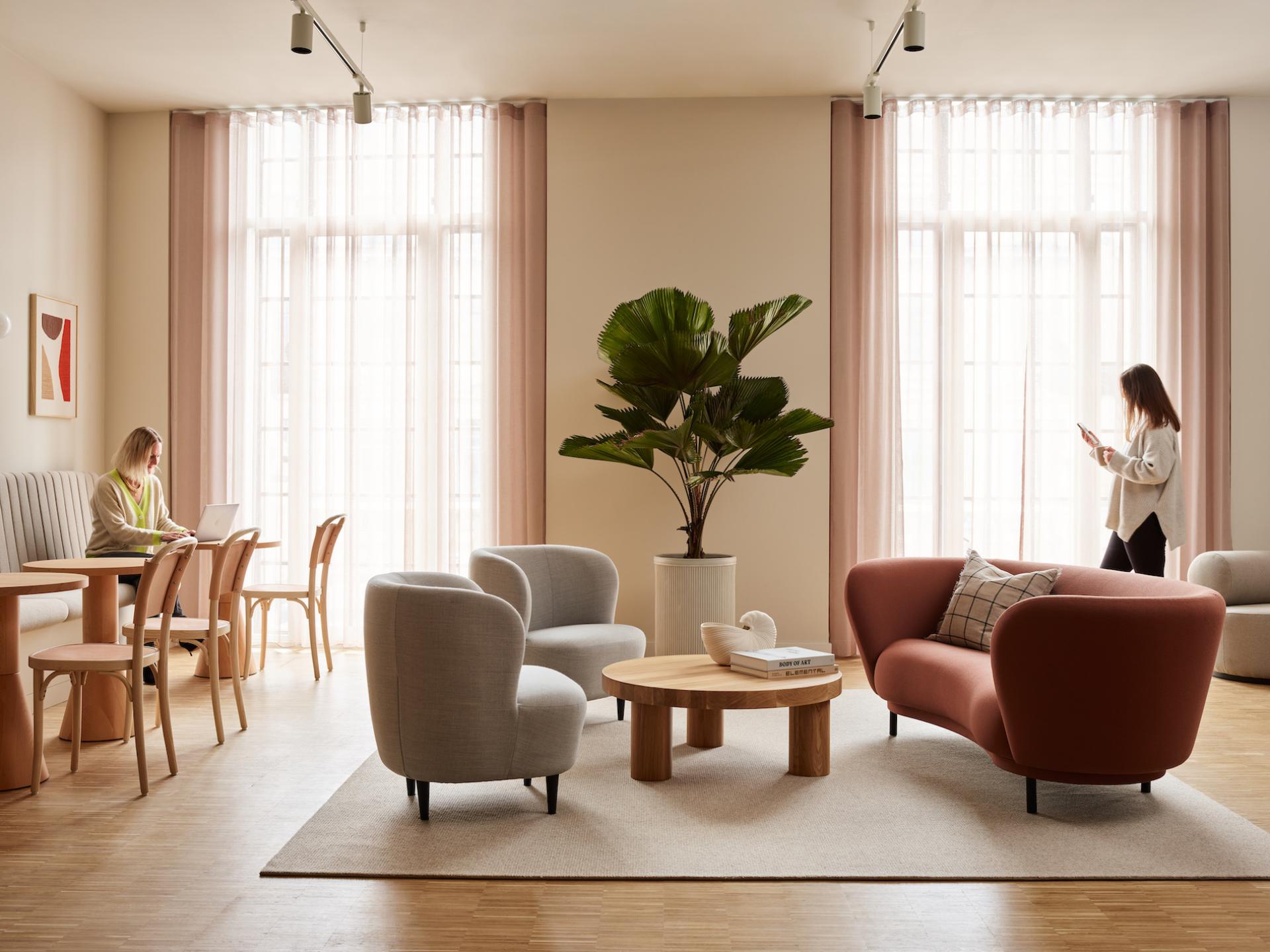 Modern flexible workspace at Liberty House featuring stylish furniture, natural light, and relaxing atmosphere in London's West End.