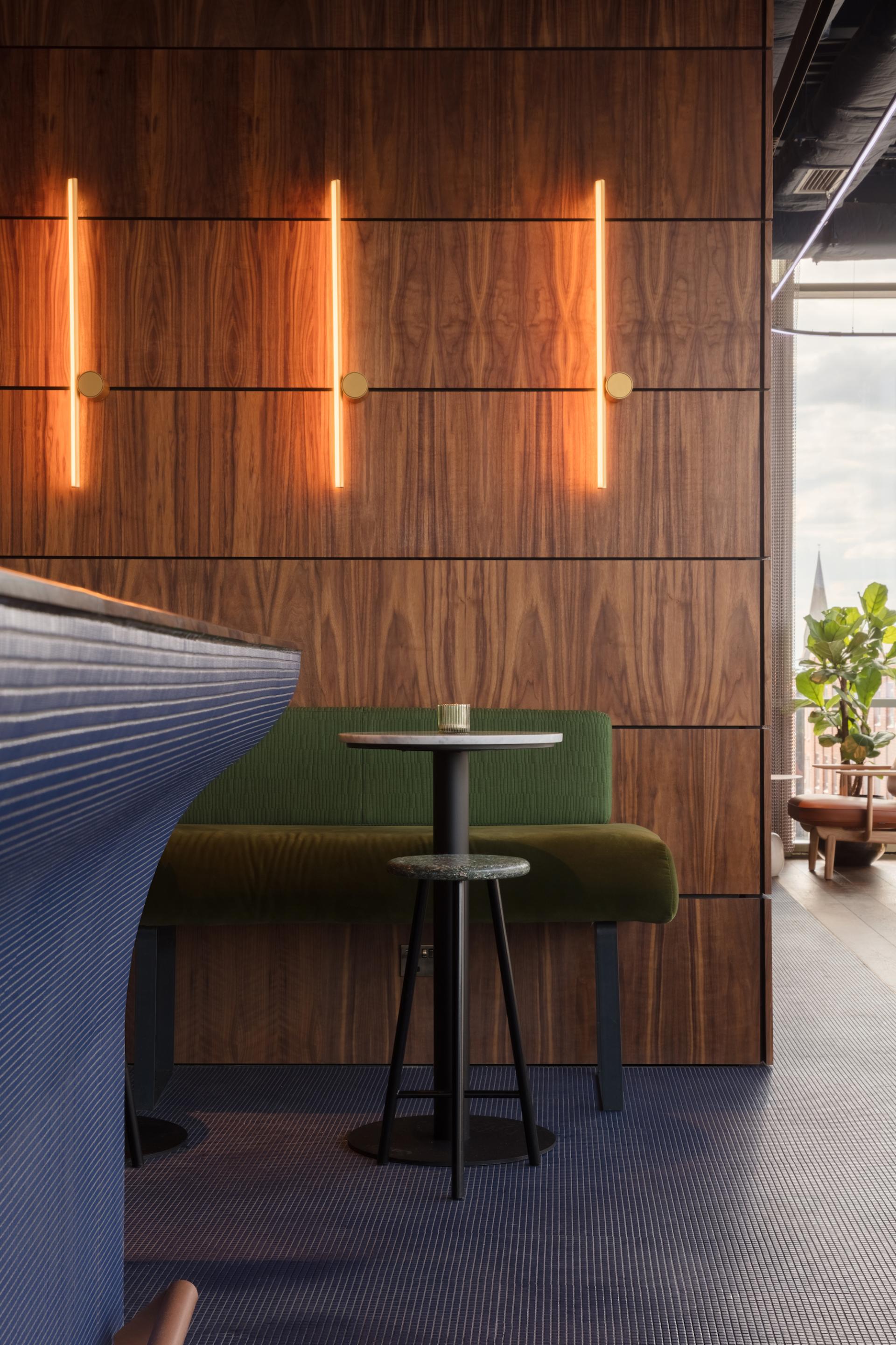 Chic interior of M'Arks Sky Bar featuring modern seating, stylish lighting, and an inviting atmosphere in London.