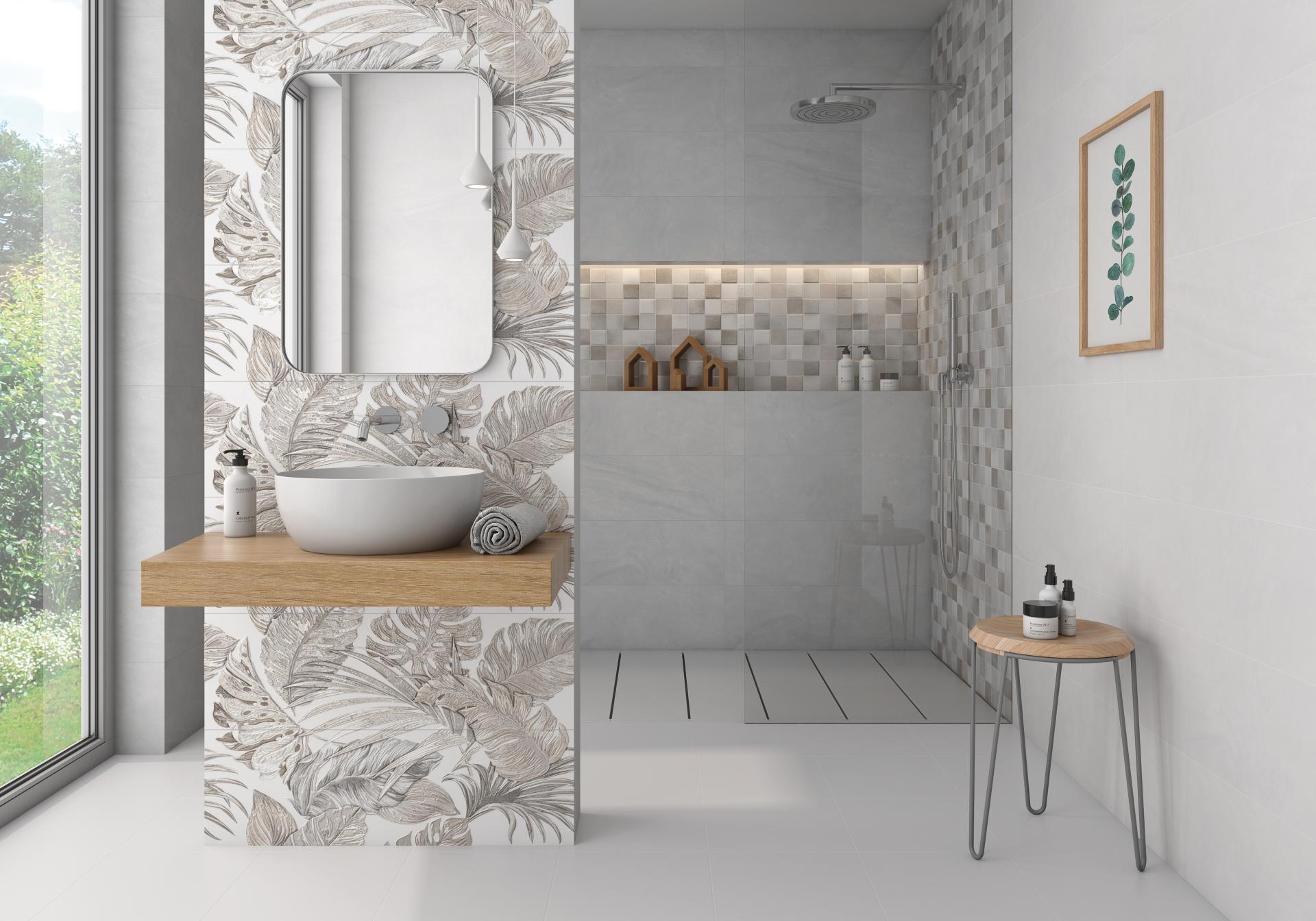 Stylish bathroom featuring tropical leaf patterned tiles, a minimalist basin, and modern decor elements for a maximalist aesthetic.