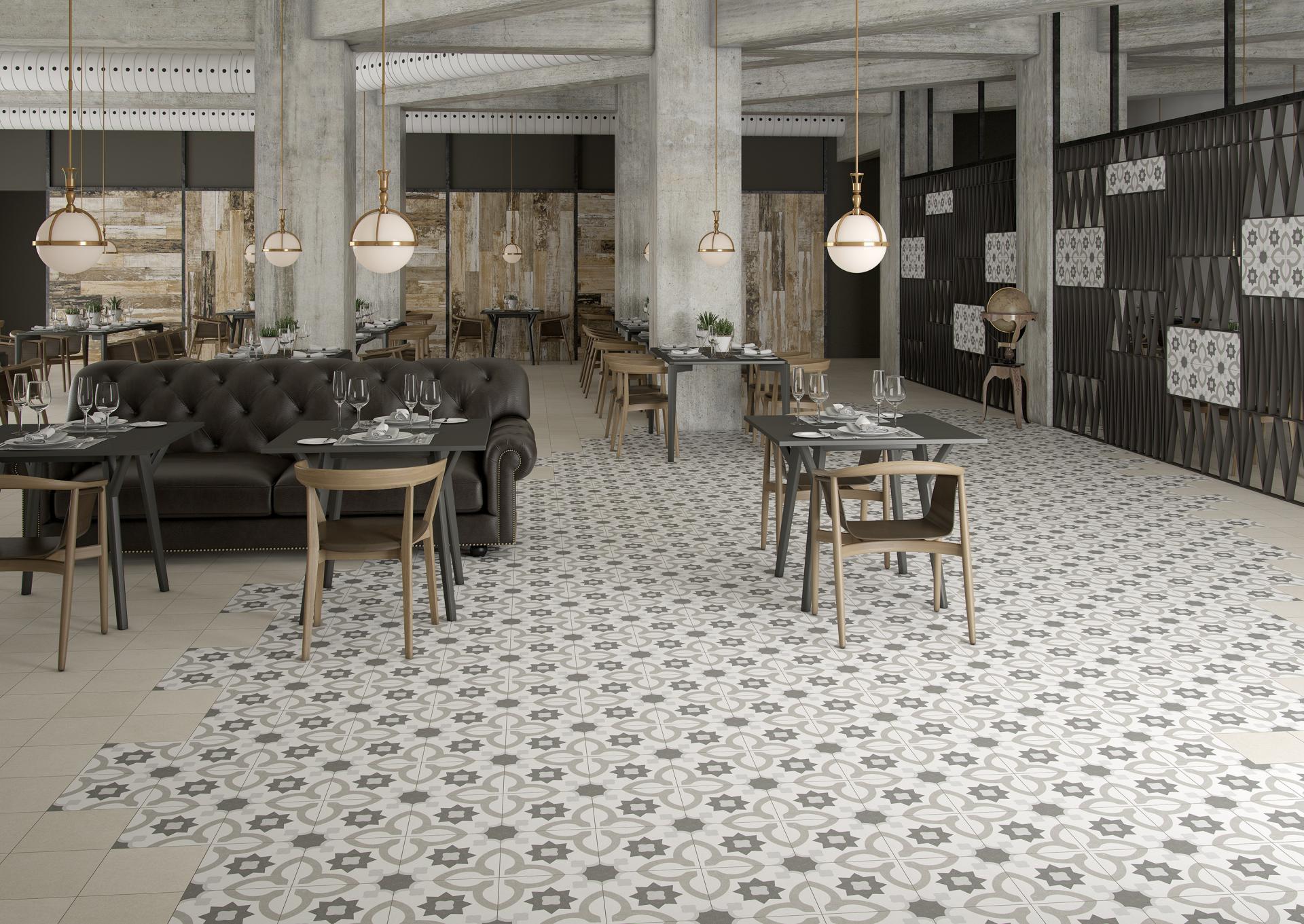 Stylish restaurant interior featuring intricate patterned tiles, modern furniture, and a blend of wood and stone textures.