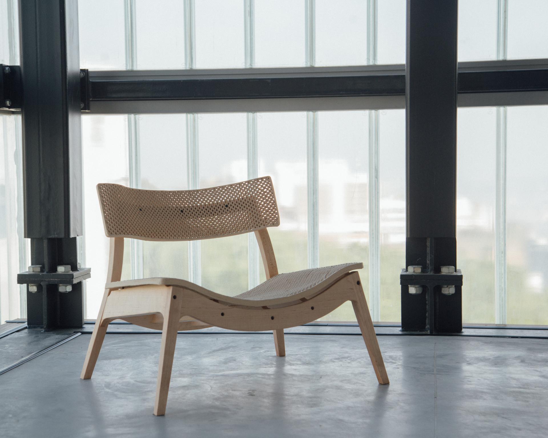 Sustainable WoodenWood Stool with a digitally fabricated woven surface, showcasing innovative design and eco-friendly materials.