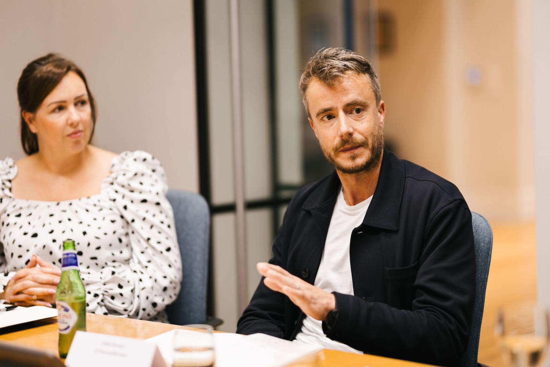 Participants engaged in discussion during Glasgow’s Property Outlook seminar, emphasizing current trends and future predictions.