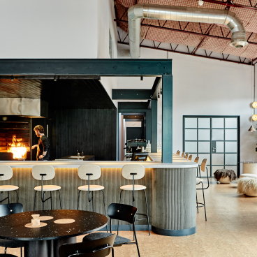 Silo, a zero-waste restaurant, featuring a modern interior design with a prominent kitchen and bar area.