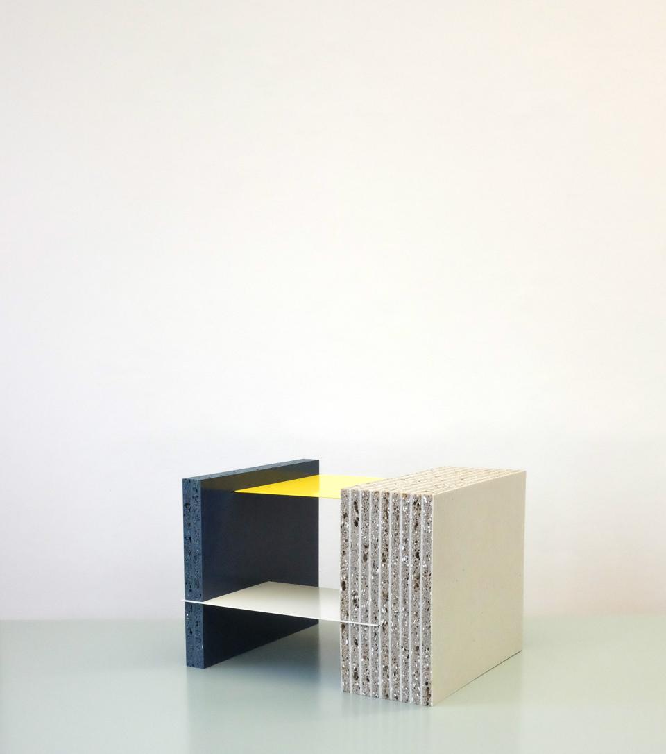 Innovative furniture design showcasing layered recycled plastic materials in vibrant colors from &New's latest collection.