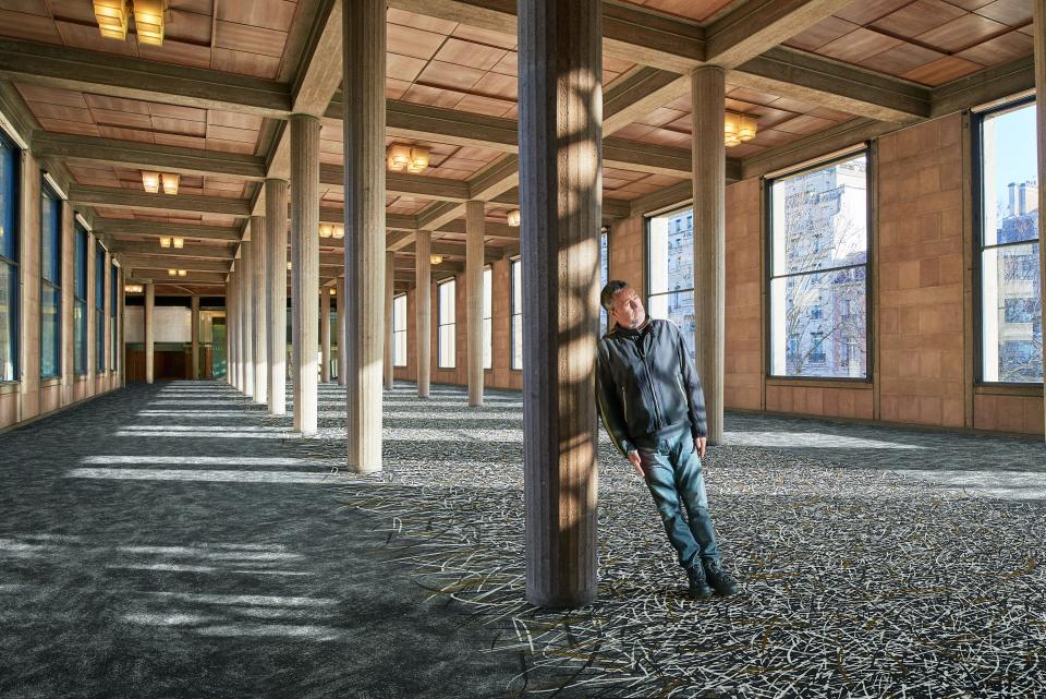 Spacious interior showcasing Forbo's Flotex By Starck floor covering, featuring stylish patterns and ample natural light.