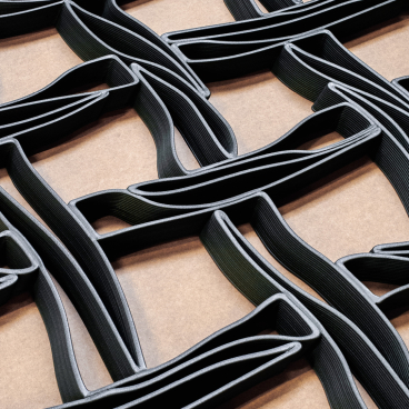 3D printed interlocking façade made from recycled materials, showcasing BOSS store's innovative design at İstinye Park, Istanbul.