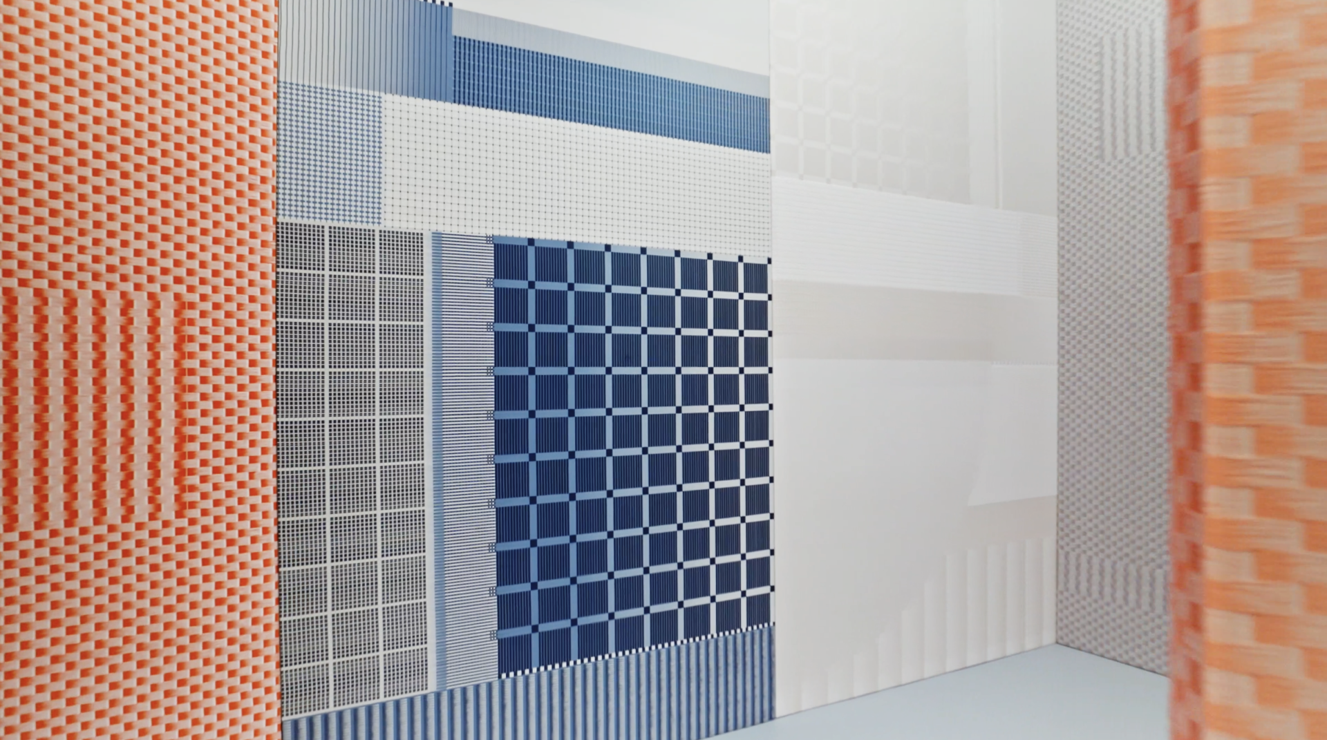 Colorful textured wall panels in various geometric patterns showcasing biotechnologies for restorative interior spaces.