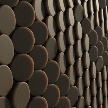 Sculptural installation featuring repurposed coffee waste, showcasing circular forms arranged in an artistic pattern for London Design Festival 2021.