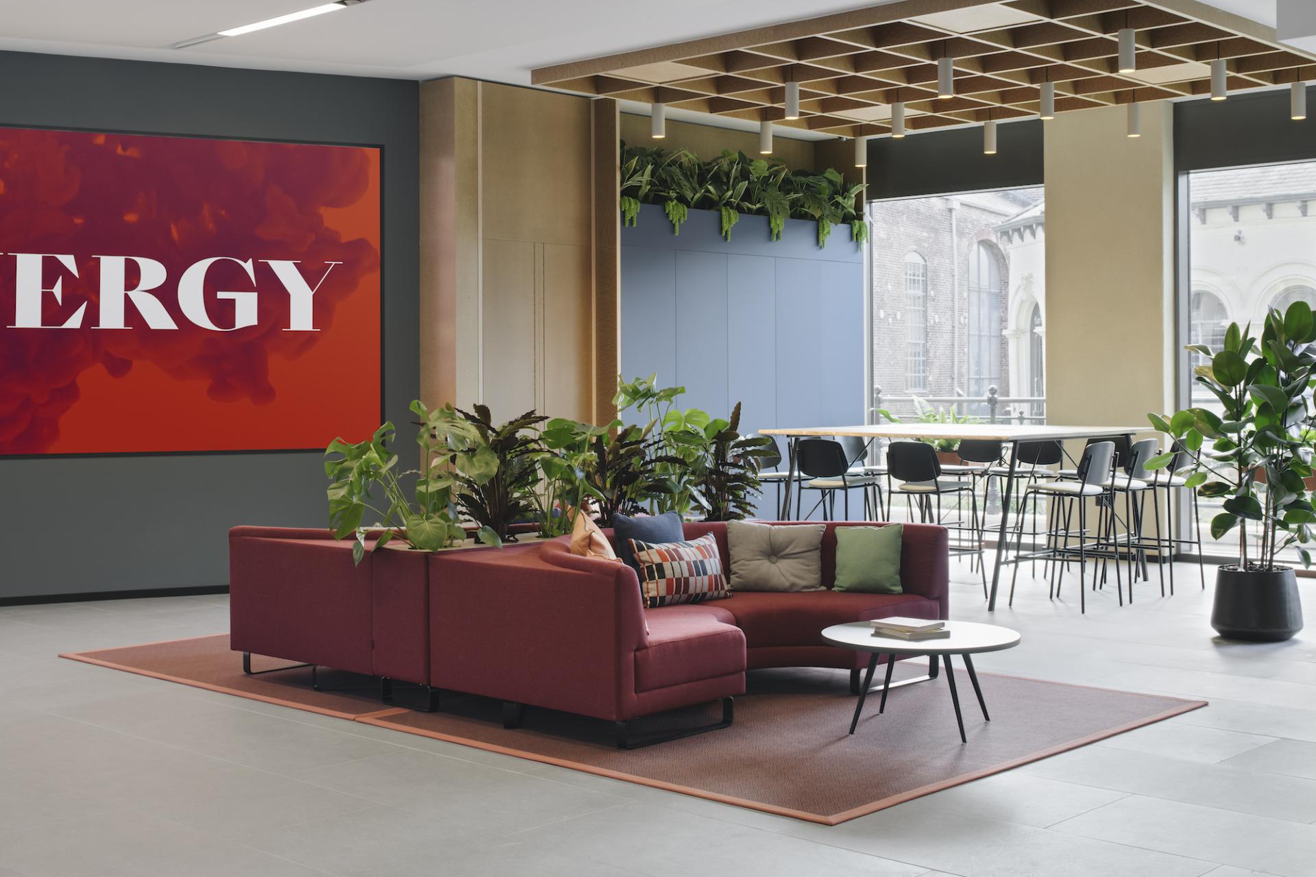 Stylish amenity space featuring modern seating, greenery, and striking artwork at Globe Point, Leeds, designed by Ekho Studio.