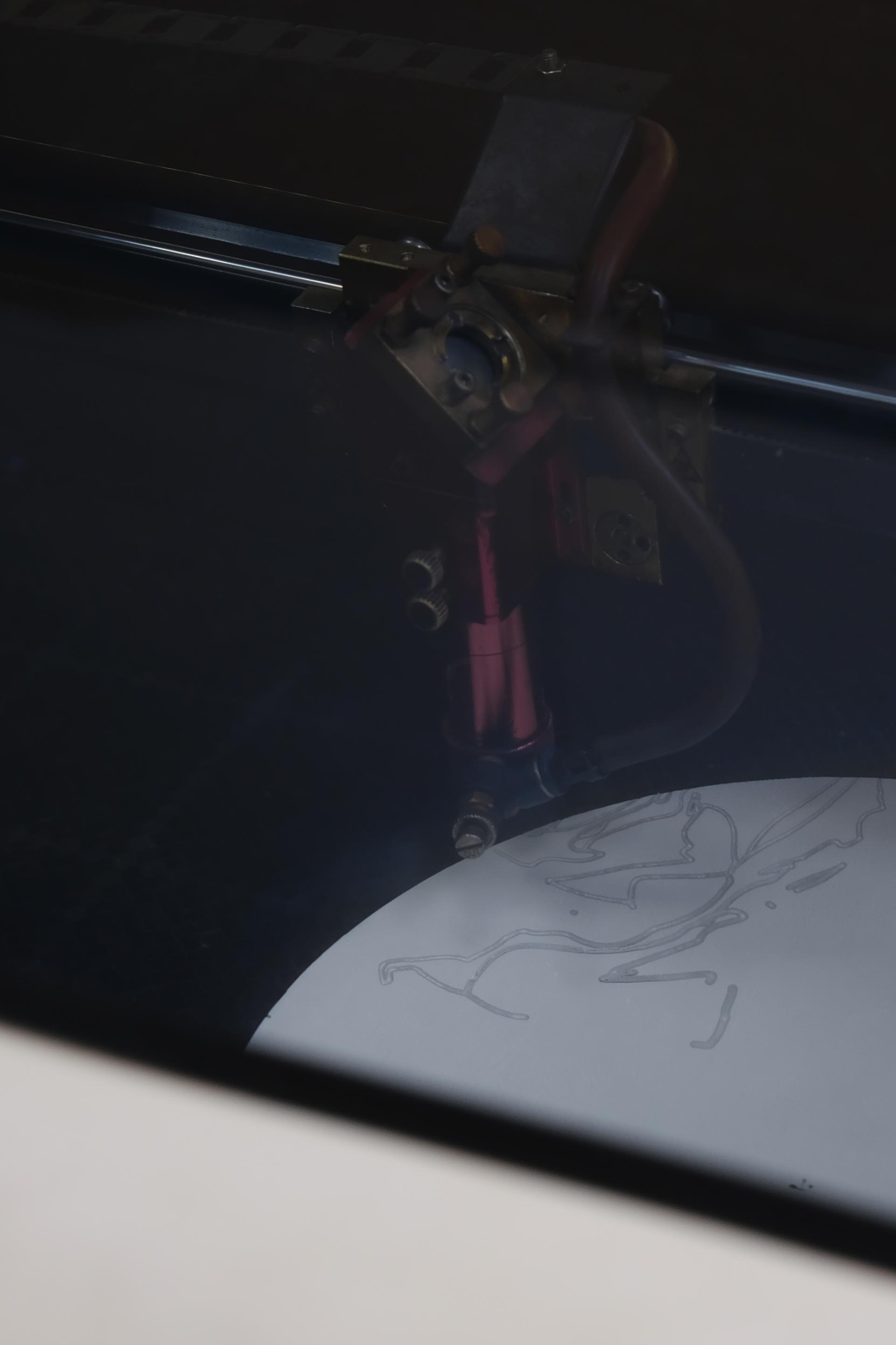 Laser engraving process showcasing innovative design techniques during Dutch Design Week 2024 highlights.