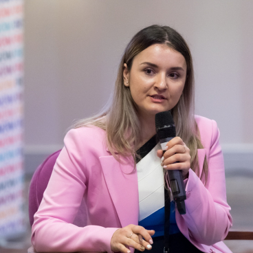 Dr. Catalina Ionita speaks passionately at an event focused on urban activation and environmental resilience.
