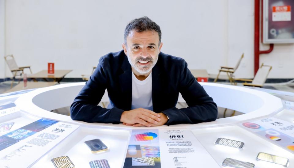 Chris Lefteri engages with innovative material designs at a sustainable CMF exhibition, highlighting luxury and creativity.