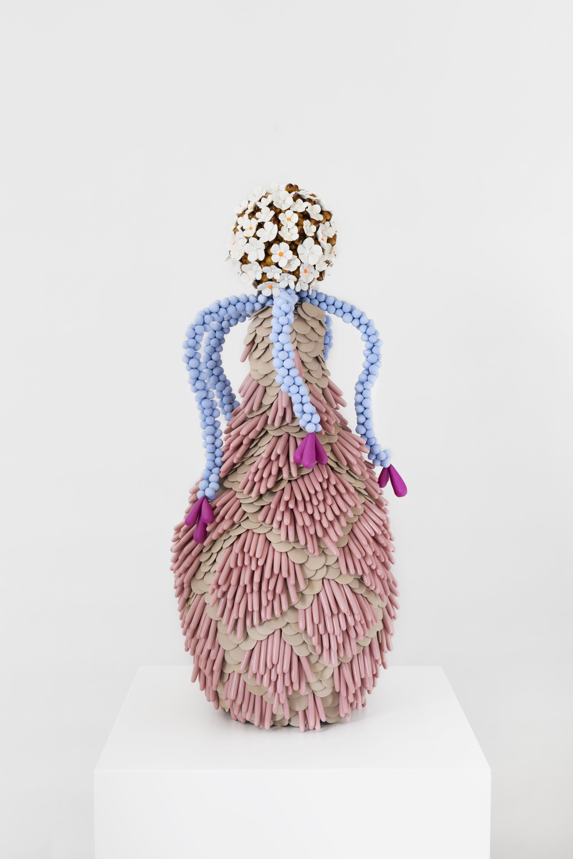 Colorful sculptural vase adorned with delicate flowers and unique textures, featured in London Craft Week 2024.
