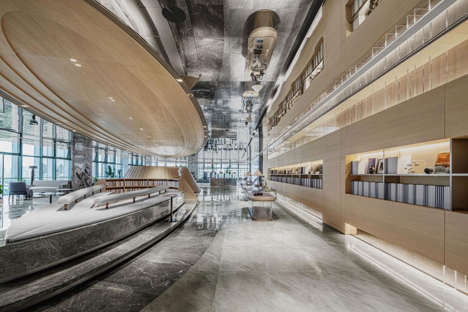 Futuristic interior design of the Foshan Vanke Financial Centre featuring sleek surfaces and innovative architectural elements.