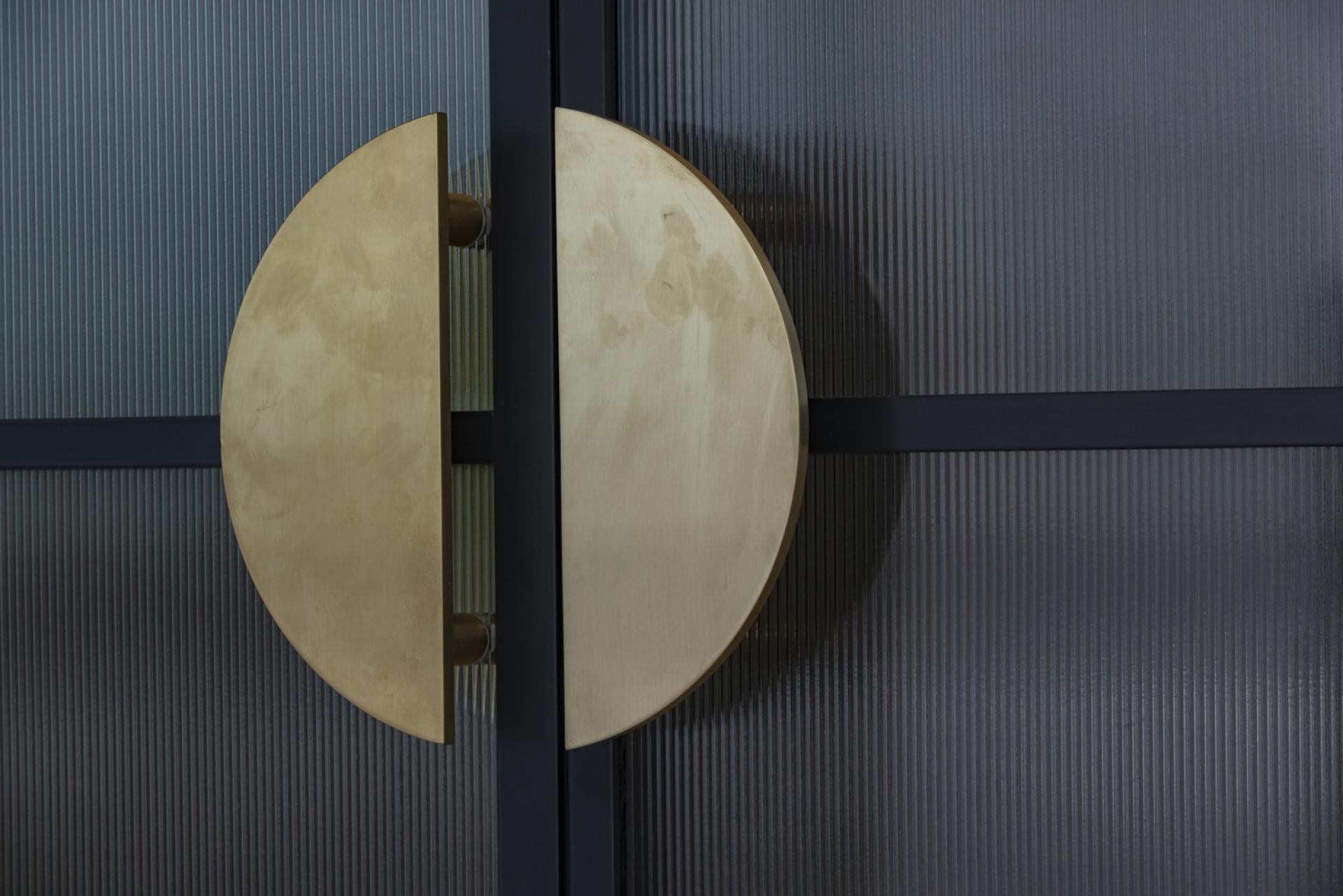 Bespoke door designs and high-end office partitions by Radii for Goodwin Procter.
